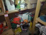 a shelf full of assorted items in a cluttered room
