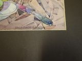 a picture of a knife and a plate of food on a table