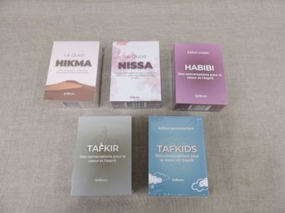 quatre boîtes de produits Nisa posées les unes à côté des autres sur une table