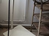 a bathroom with a toilet and a sink in it