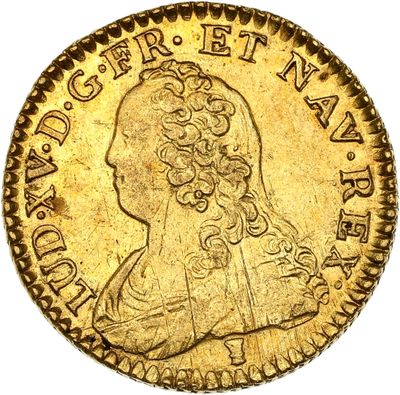 l'image d'une pièce d'or sur laquelle figure une tête de femme