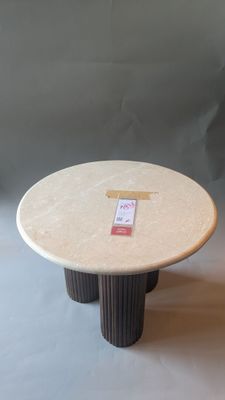 a small table with a sticker on top of it