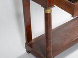 a marble top table with a drawer underneath it