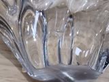 a clear glass bowl on a wooden table