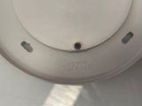a close up view of a smoke detector on a table