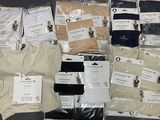 several pairs of men ' s underwear are laid out on a table