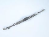 bracelet made of silver metal with a long chain and a clasp