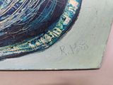 a close up of a painting on a table