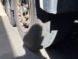 a close up of a flat tire on a truck
