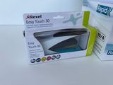 packaging of a boxed box of a computer mouse and a computer mouse on a table