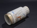 a white cup with a picture of a dog and a cat on it