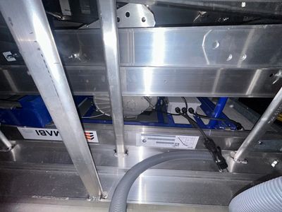 a picture of a machine that is working on a piece of metal