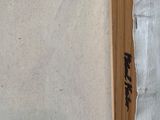 a picture of a piece of paper taped to a piece of wood