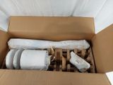 a cardboard box with a bunch of rolls of toilet paper in it
