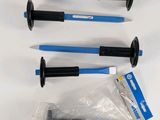 four different types of screws and a plastic bag on a white surface