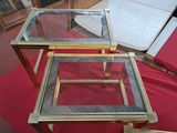 two tables that are sitting on a red table cloth