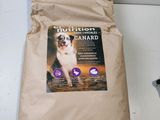 a bag of dog food sitting on a counter