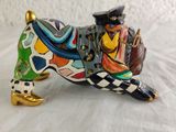 a figurine of a dog with a hat on it