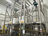 an image of a factory with a lot of machines