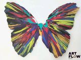 painting of a colorful butterfly on a white background with the words art flow