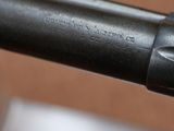a close up of a gun that is on a table