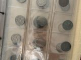 a book with a bunch of coins inside of it