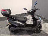a scooter that is parked in a room
