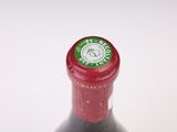 a bottle of wine that is sitting on a table