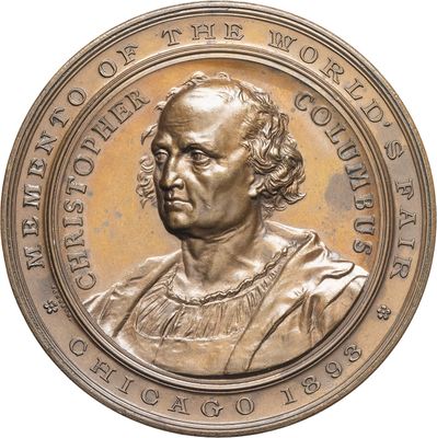 an image of a bronze medallion with a portrait of a man