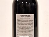 a bottle of wine that is sitting on a table