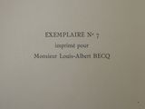 an open book with the title exemplaire no 7 in french on it