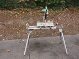a machine that is sitting on a table in the middle of the road