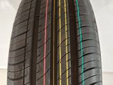 a close up of a tire on a white surface