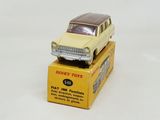 a yellow toy car sitting on top of a yellow box