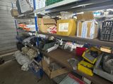 many boxes and boxes on the shelves in the garage