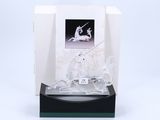 crystal figurine of a unicorn and a horse on a black base