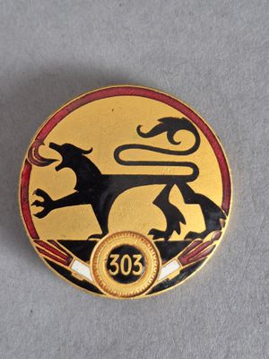une image représentant un insigne doré et noir orné d'un lion