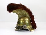 an image of a helmet with a feather on top of it