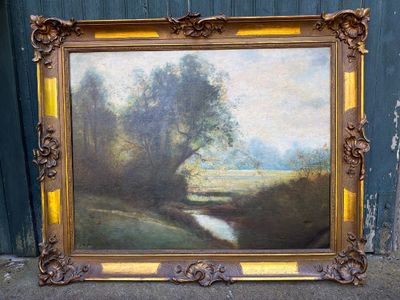tableau représentant un paysage avec une rivière et des arbres, dans un cadre doré