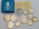 a box of coins and a card with a picture of a bird on it