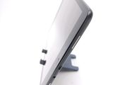 a close up of a cell phone on a stand