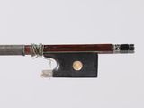 an image of a violin bow with a piece of string attached to it