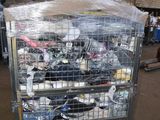 a cart full of trash sitting in a warehouse