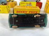 many toy cars that are sitting on a table