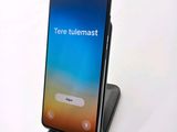 the back view of a smartphone with the text telemast on the screen