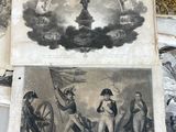 several old prints of military uniforms are on display on a table
