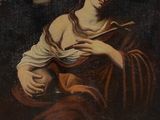 une image représentant un tableau où l'on voit une femme tenant un livre