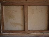 a picture of a window with a wooden frame in it