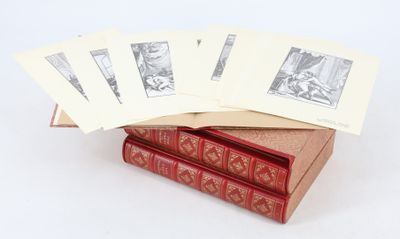 plusieurs livres sont empilés sur une table