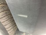 a close up of a tire on the ground